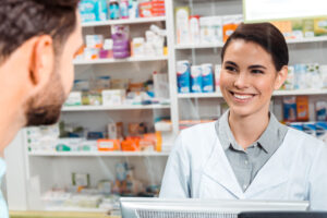 pharmacists selling medicine through prescription savings card program