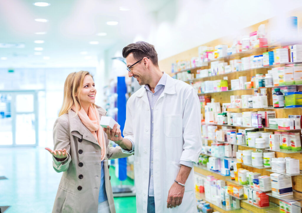 woman buying medication through prescription savings card program