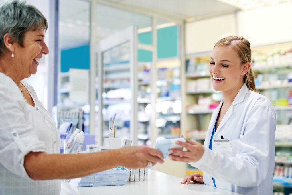 She wants whats best for her customers. a young pharmacist assisting a customer.