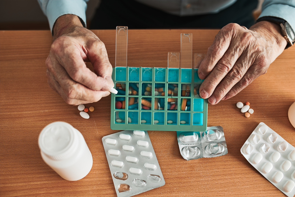 Senior-man-organizing-his-internet-prescription-drugs